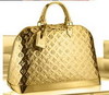 Gold Louis Vuitton Alma Handbag