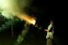 70 Roman Candles Tied to a Stick