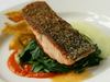 Salmon on a bed of greens