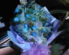 a bouquet of blue roses