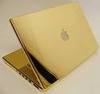 a gold macbook pro