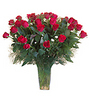4 dozen red roses in a vase
