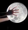 a moon, handed with great caring